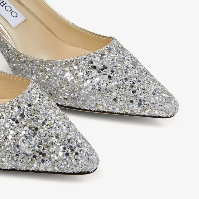 Romy 60 spetsiga pumps i grovt glittertyg i champagne Romy 60 spetsiga pumps i grovt glittertyg i champagne