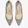 Romy 60 spetsiga pumps i grovt glittertyg i champagne Romy 60 spetsiga pumps i grovt glittertyg i champagne