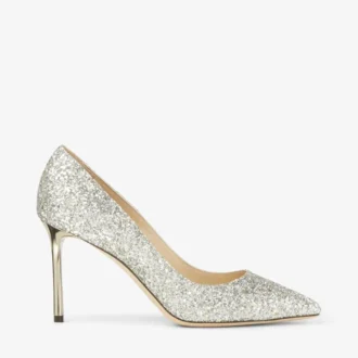 Romy 85 Pumps i grovt glittertyg i champagnefärg med spetsig tå