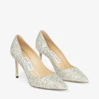 Romy 85 Pumps i grovt glittertyg i champagnefärg med spetsig tå