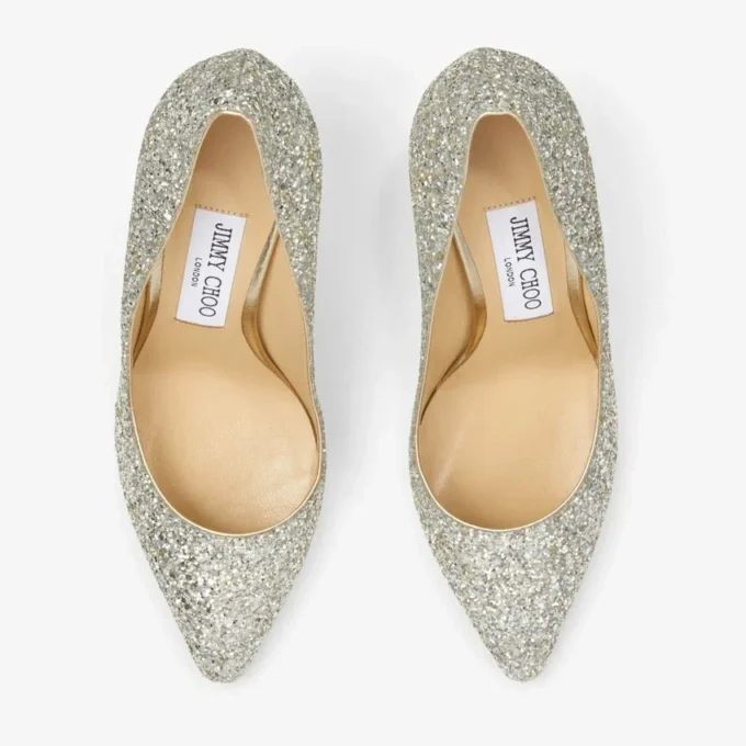Romy 85 Pumps i grovt glittertyg i champagnefärg med spetsig tå Romy 85 Pumps i grovt glittertyg i champagnefärg med spetsig tå