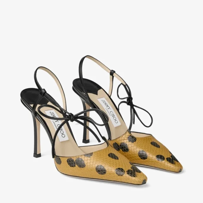 Sandaler med rosett i prickigt läder med elaphe-tryck och knutdetalj Sandaler med rosett i prickigt läder med elaphe-tryck och knutdetalj