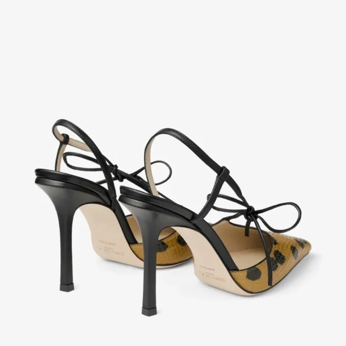 Sandaler med rosett i prickigt läder med elaphe-tryck och knutdetalj Sandaler med rosett i prickigt läder med elaphe-tryck och knutdetalj