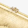 Skylar guldfärgad clutch i Candy Wrap-läder med fyrkantigt Jc-spänne