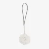 Stickad blomsterberlock Latte-färgad blomsterberlock i stickad ull med läderdetaljer