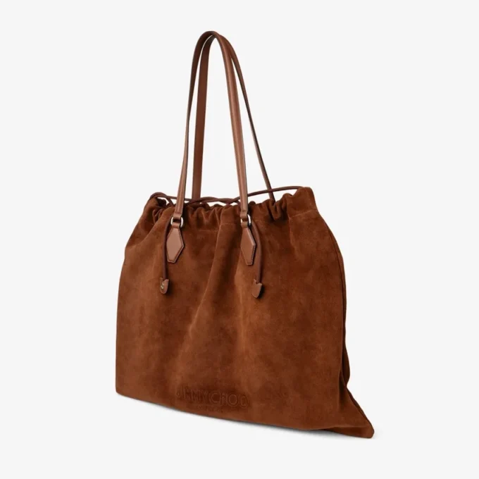 Stor toteväska i tanfärgat mocka och slätt kalvskinn med dragsko och Jimmy Choo-logotyp Stor toteväska i tanfärgat mocka och slätt kalvskinn med dragsko och Jimmy Choo-logotyp