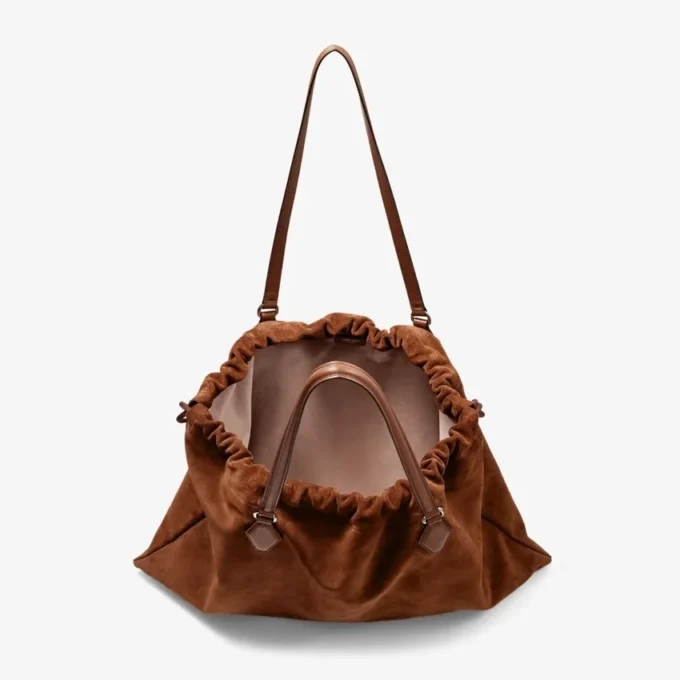 Stor toteväska i tanfärgat mocka och slätt kalvskinn med dragsko och Jimmy Choo-logotyp Stor toteväska i tanfärgat mocka och slätt kalvskinn med dragsko och Jimmy Choo-logotyp
