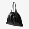 Stor toteväska med dragsko i svart nappaläder med präglad jimmy choo