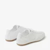 Sunny F – Låga sneakers i en mix av vitt och gummi-färgat läder