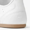Sunny M vita och gummi-läderblandade låga sneakers Sunny M vita och gummi-läderblandade låga sneakers