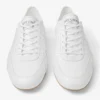 Sunny M vita och gummi-läderblandade låga sneakers Sunny M vita och gummi-läderblandade låga sneakers