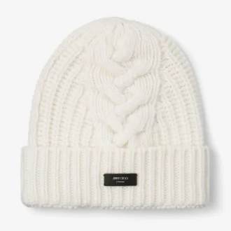 Yuki Cable Latte kabelstickad mössa med läderlogotyp