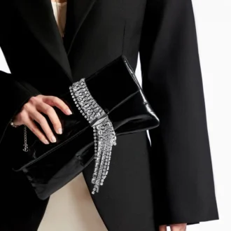 Zandra svart vintage-clutch i metalliskt läder